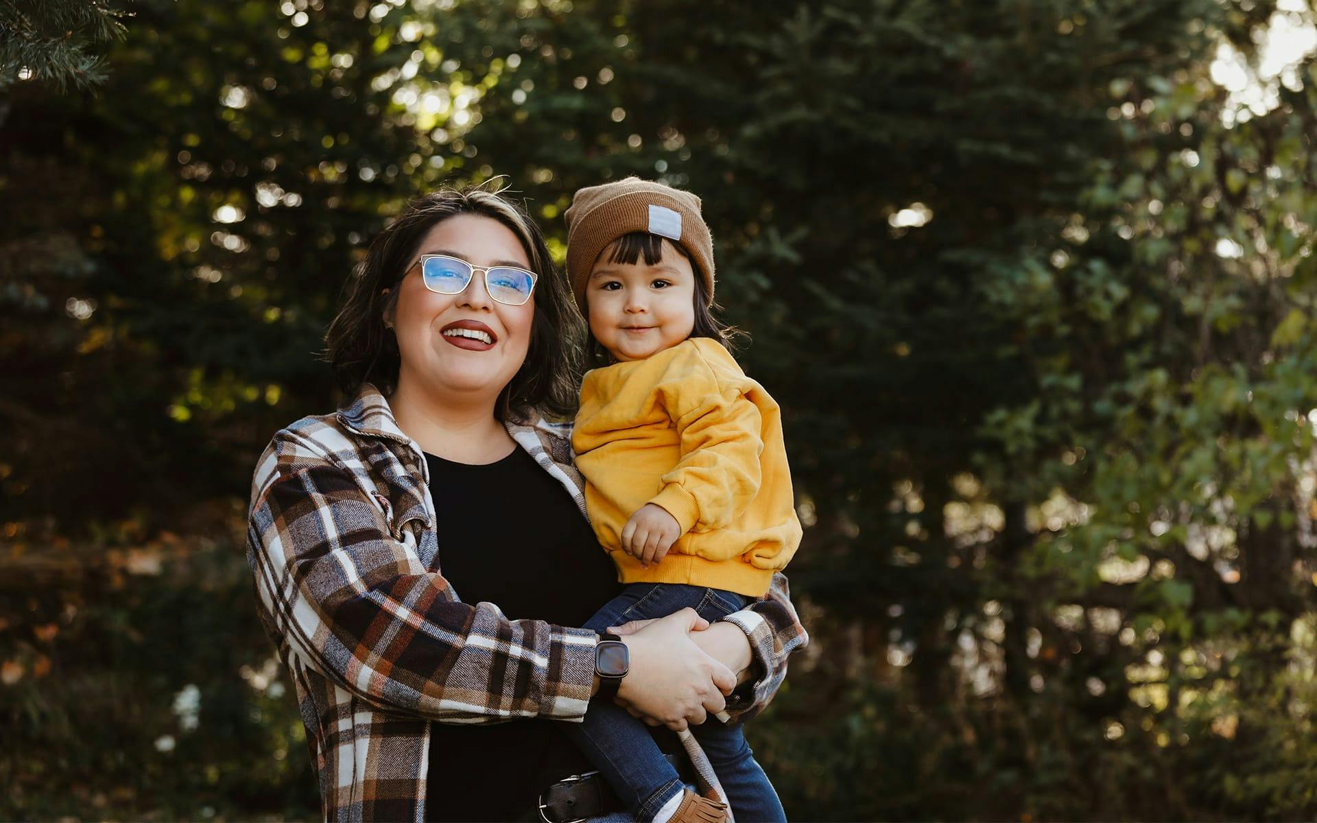 woman and daughter together outside