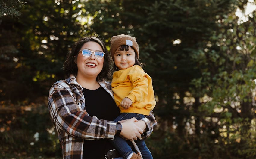 woman and daughter together outside