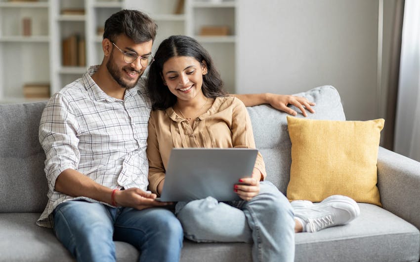 couple looking at laptop together