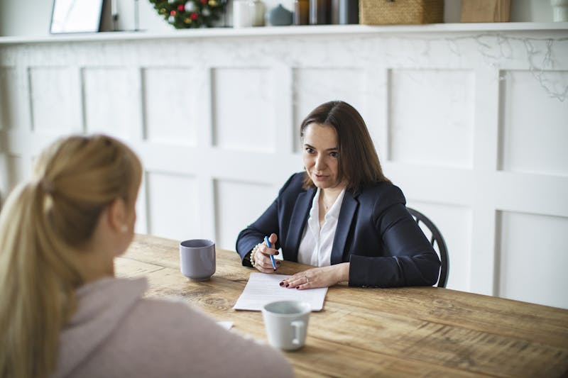 Attorney giving advice to young woman