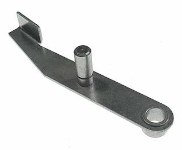 Kicker arm assembly