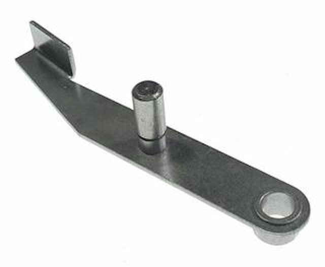 Kicker arm assembly