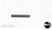 Shuffle pin trip actuator shaft