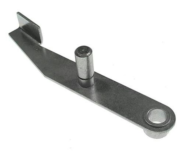 Kicker arm assembly