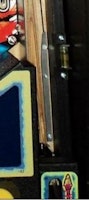 Ball deflect plate - left