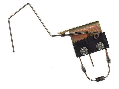 Rollover switch assembly shooter lane