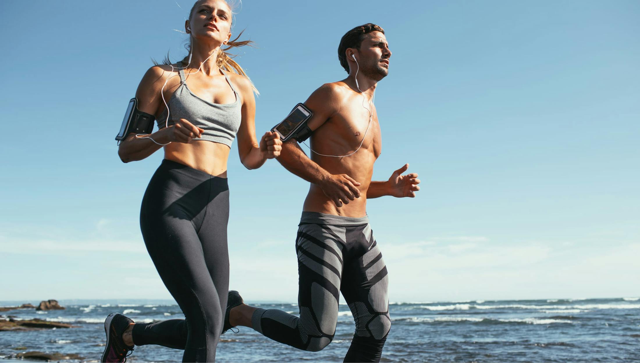 couple running at the beach