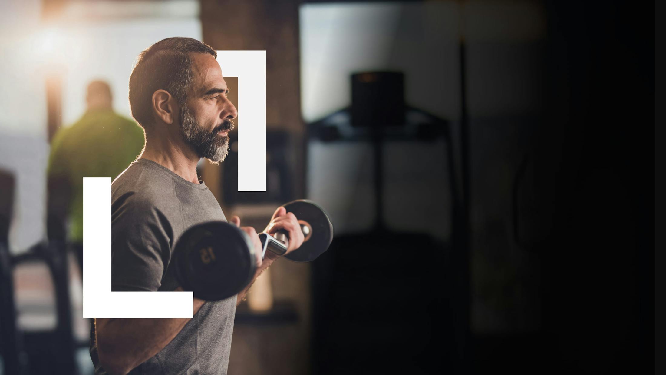 man lifting weights