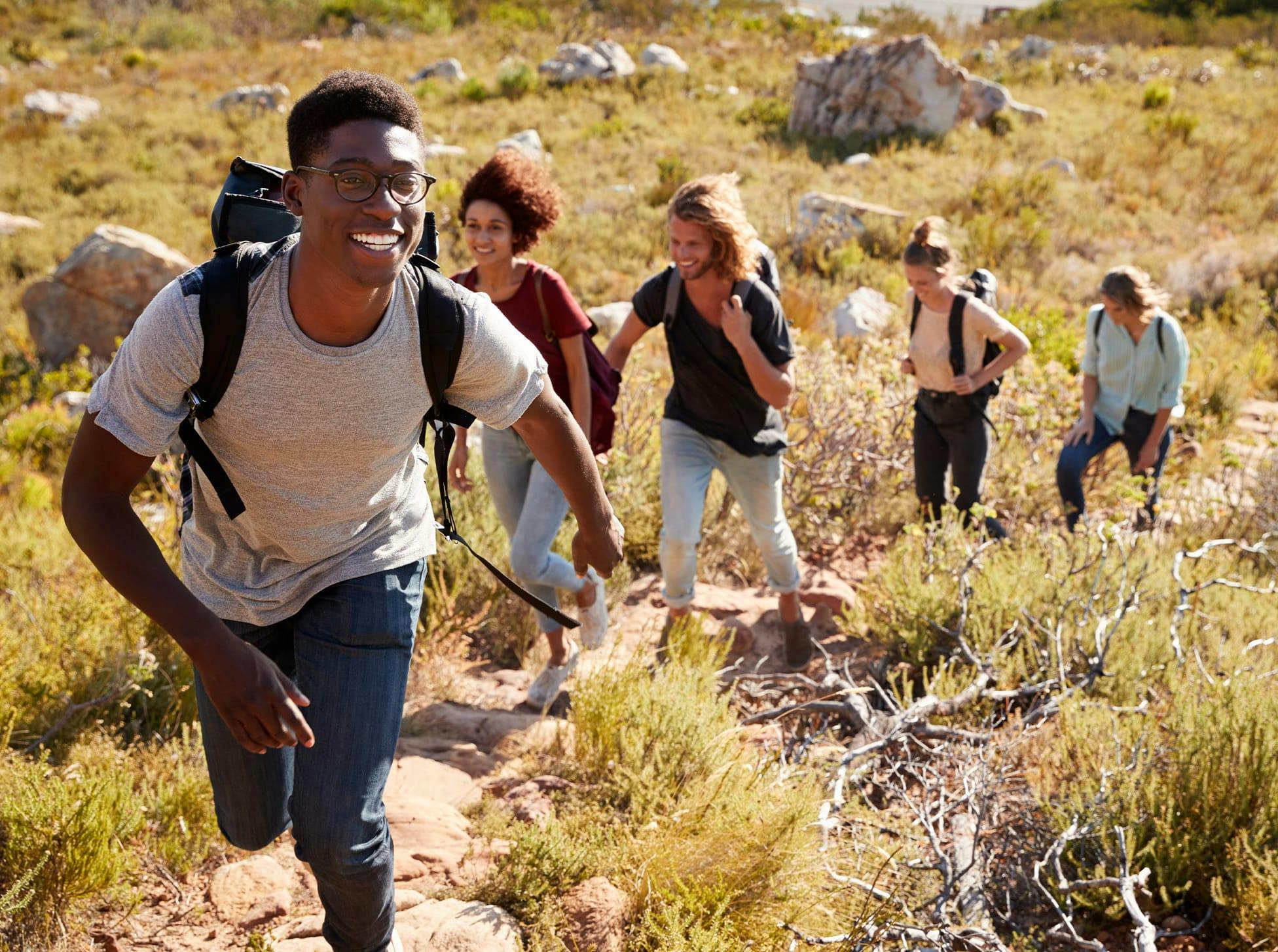 five people on a hike