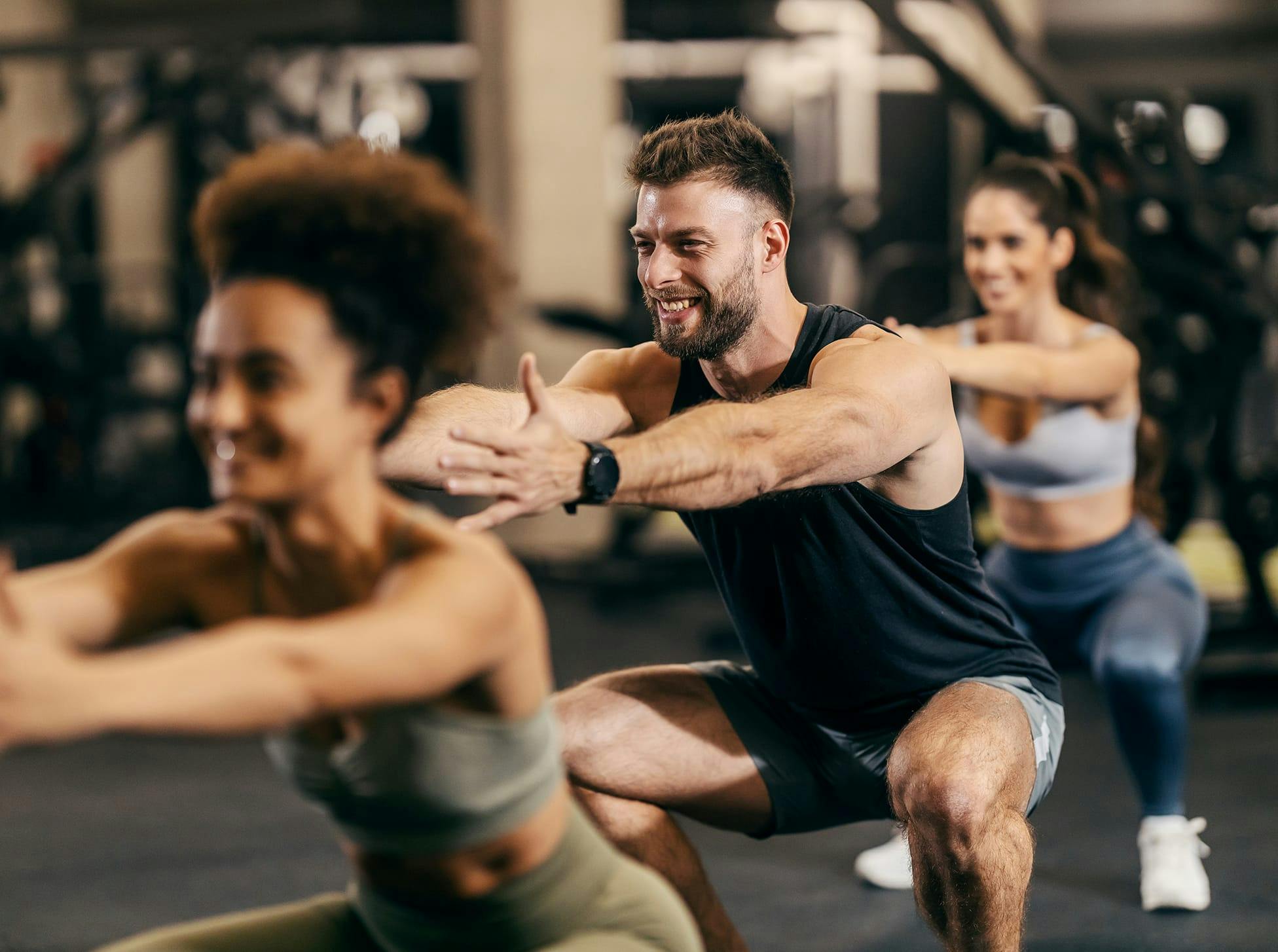 three people working out