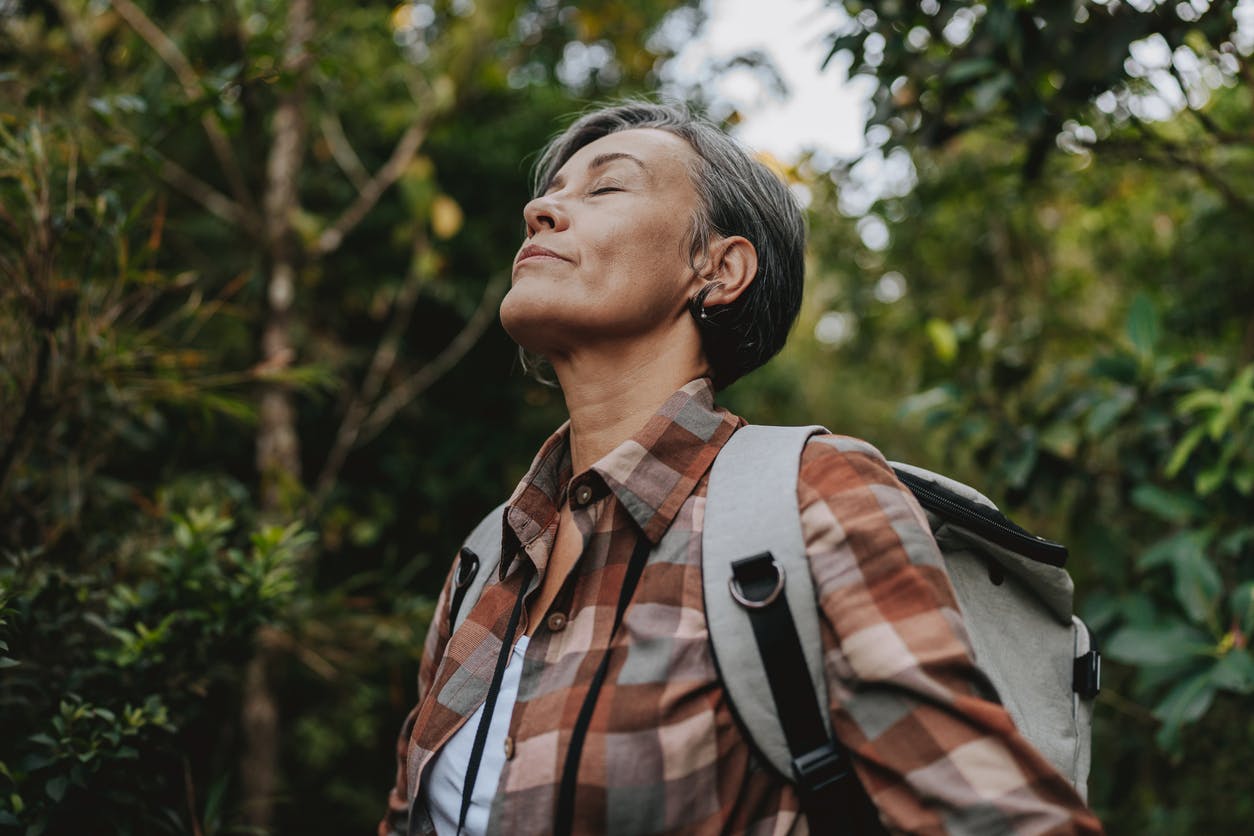 woman relaxing in the forest
