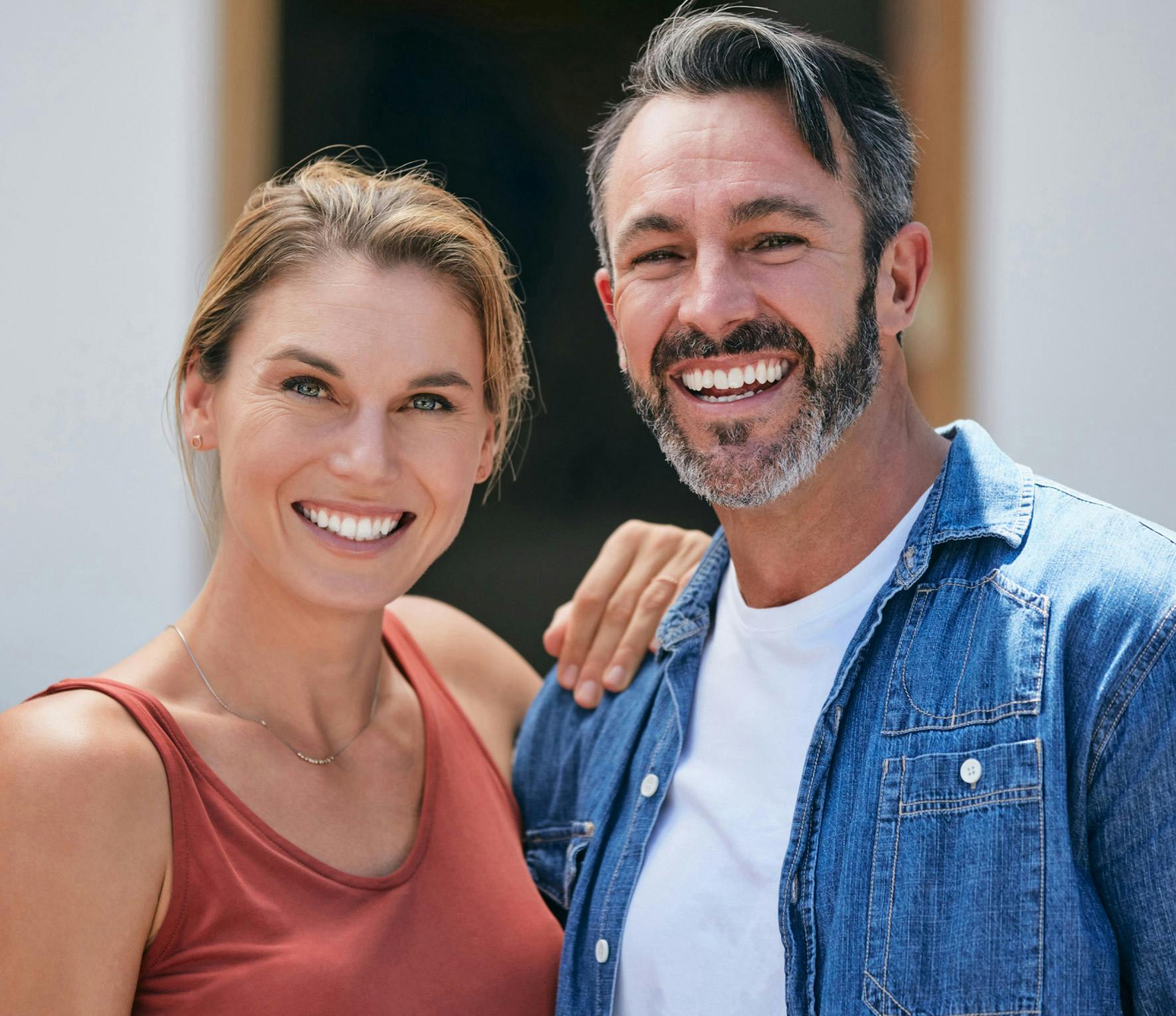 couple smiling side by side