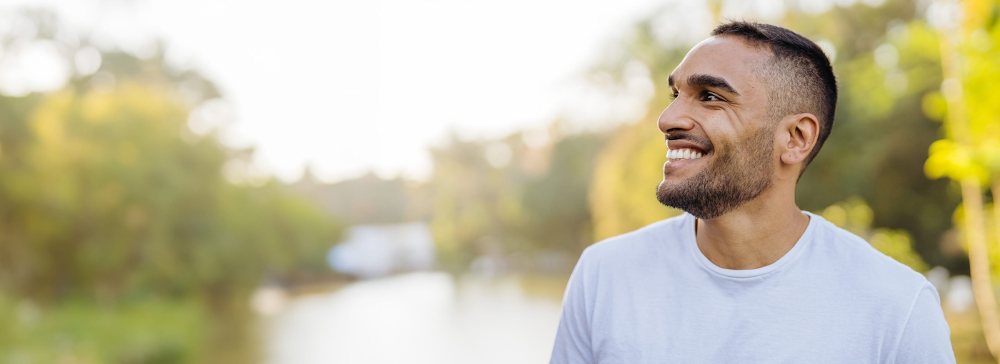 Man smiling outside