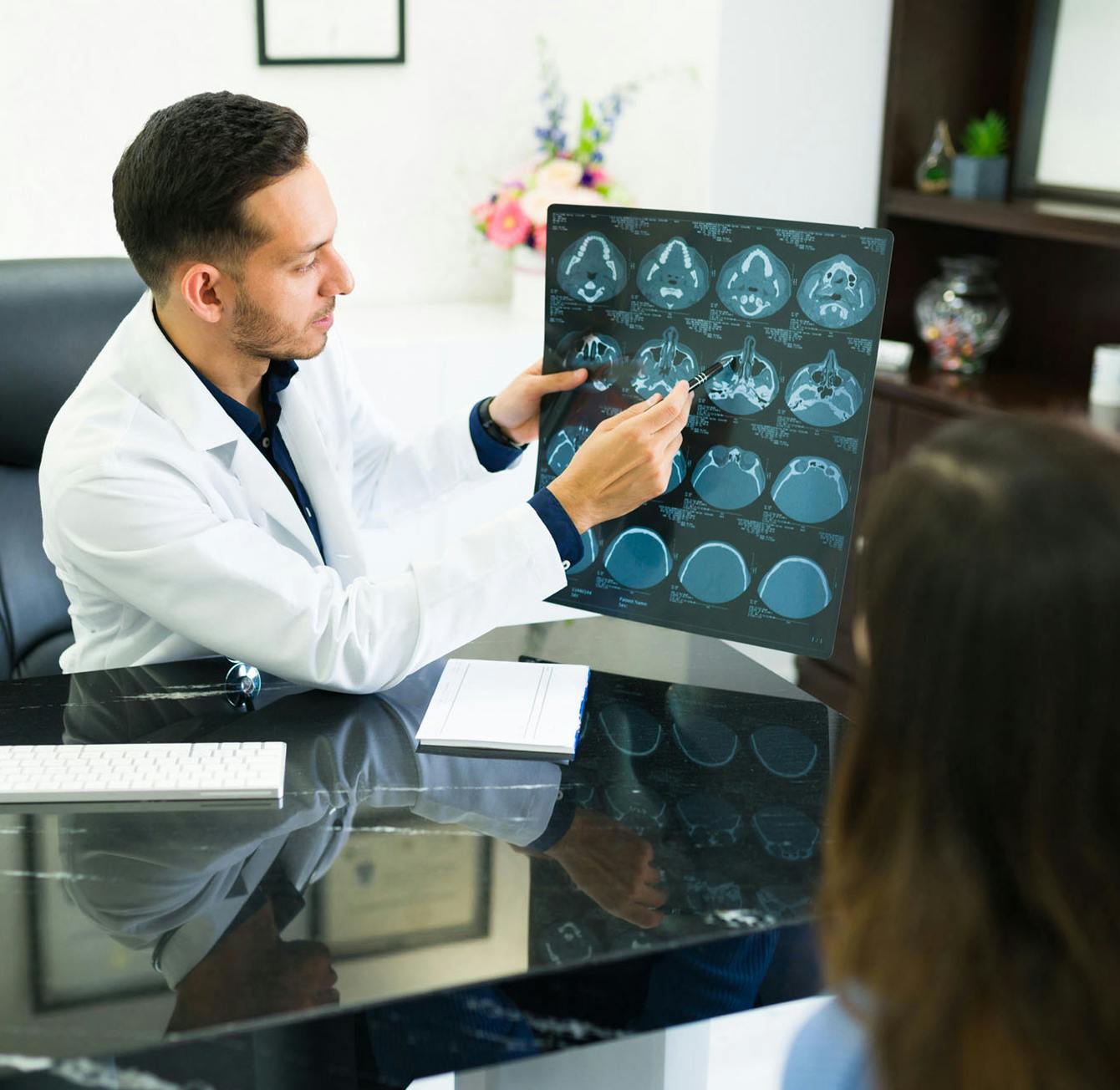 Doctor going over x-rays with patient