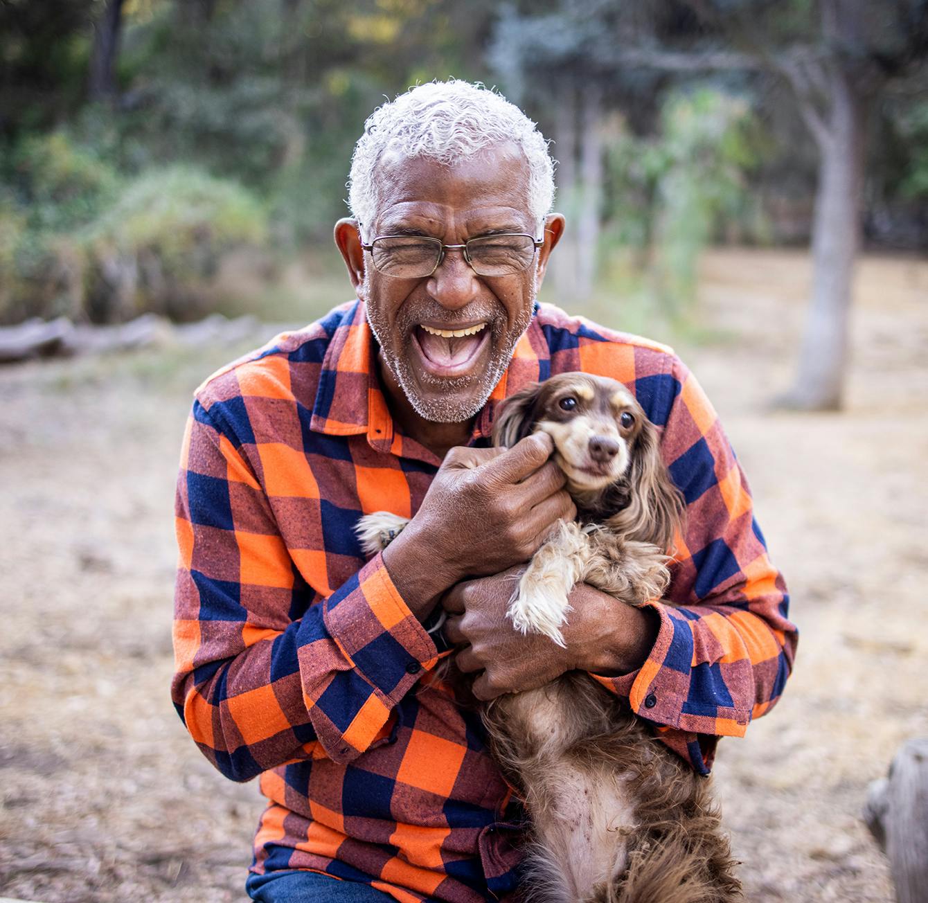 Older man with a dog