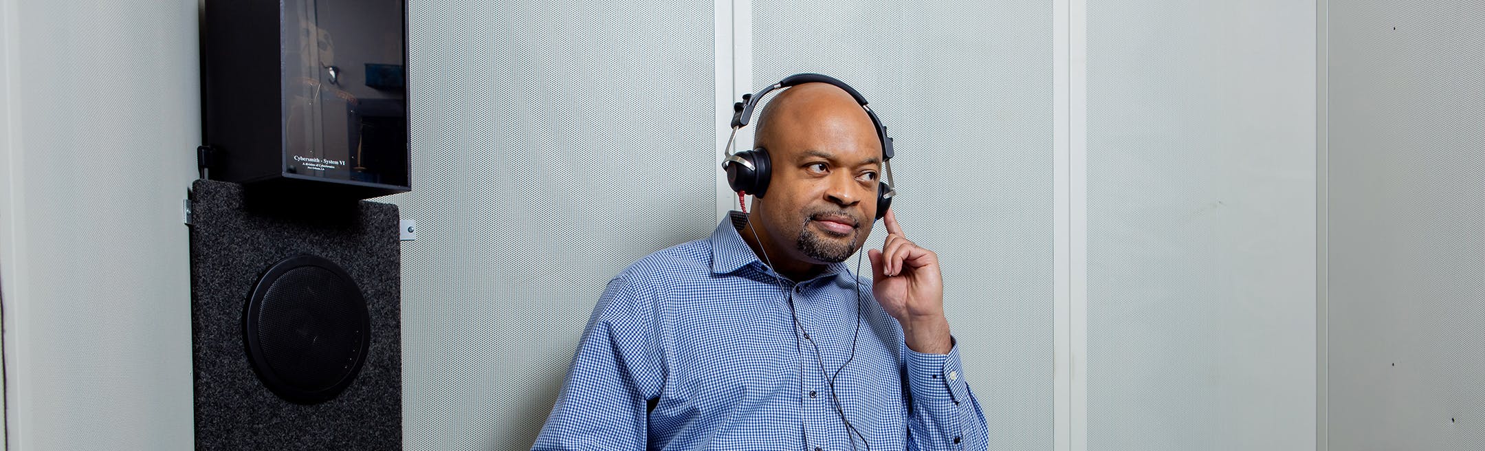 man listening to headphones