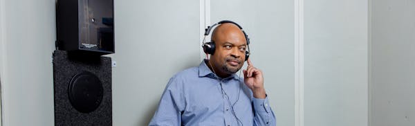 man listening to headphones