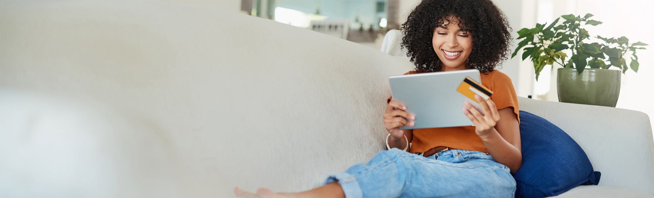 woman making a payment on her tablet