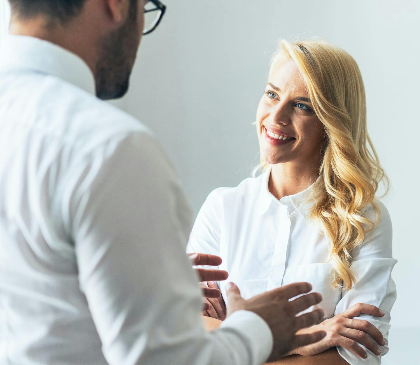 Male doctor explaining procedure to female patient
