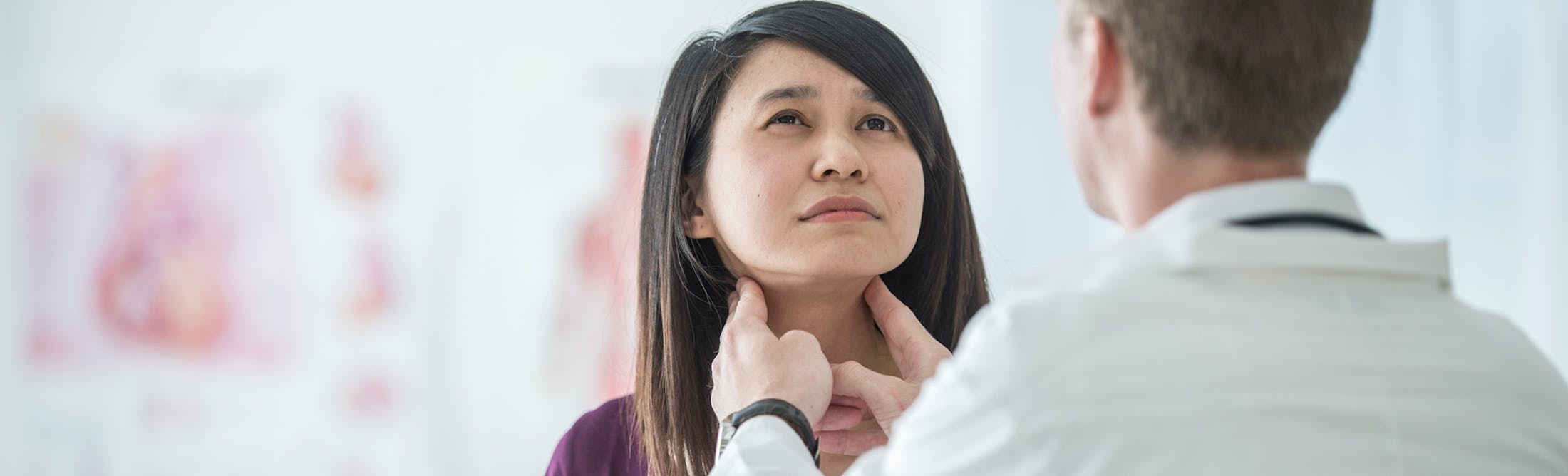 doctor checking throat