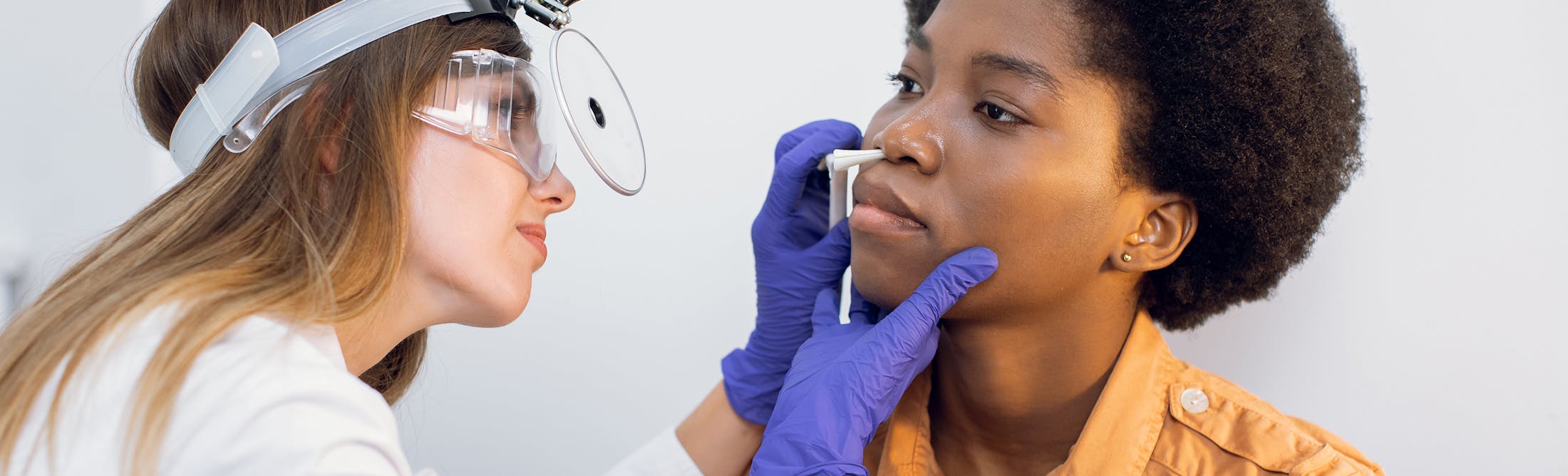 woman having her airway checked