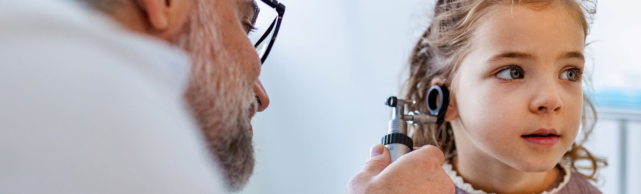 child getting an ear exam