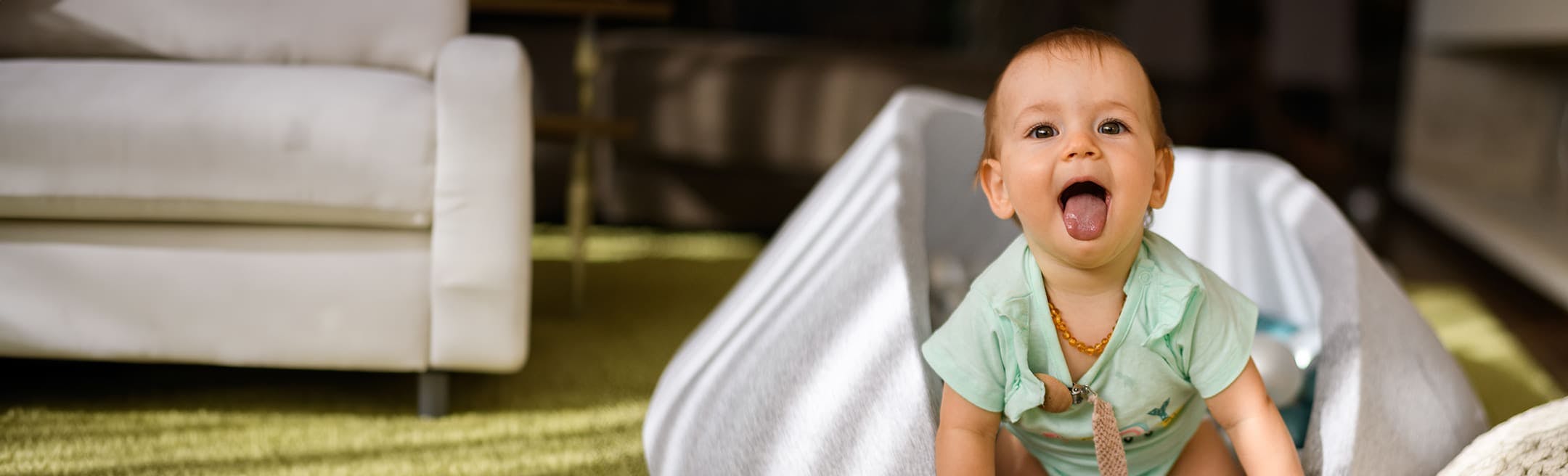 toddler sticking their tongue out