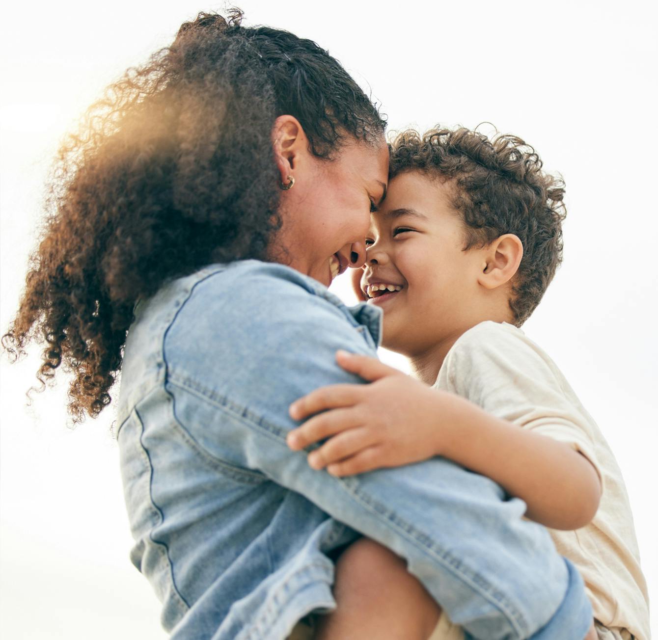 woman hugging her child