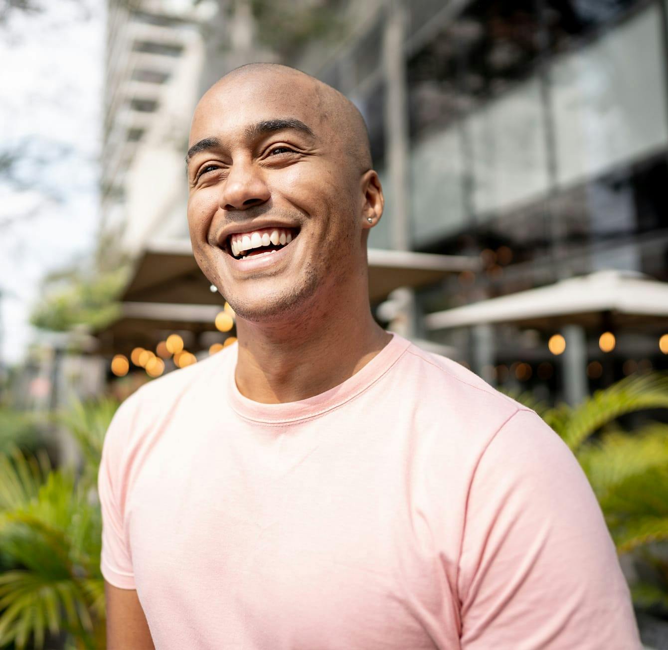 man in a pink shirt