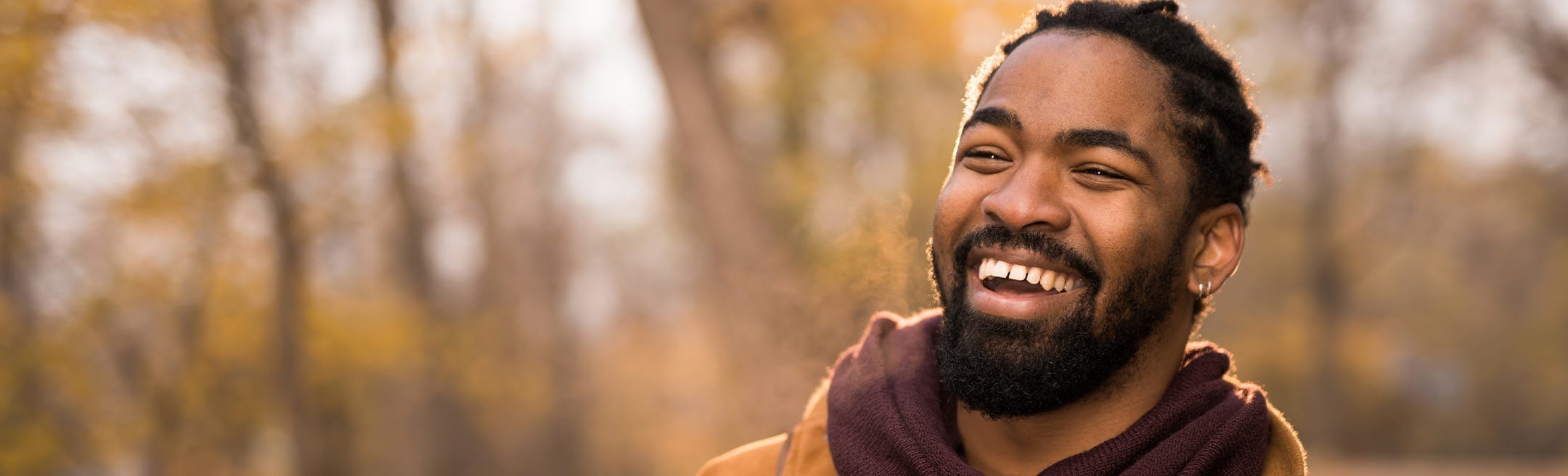 man smiling outside