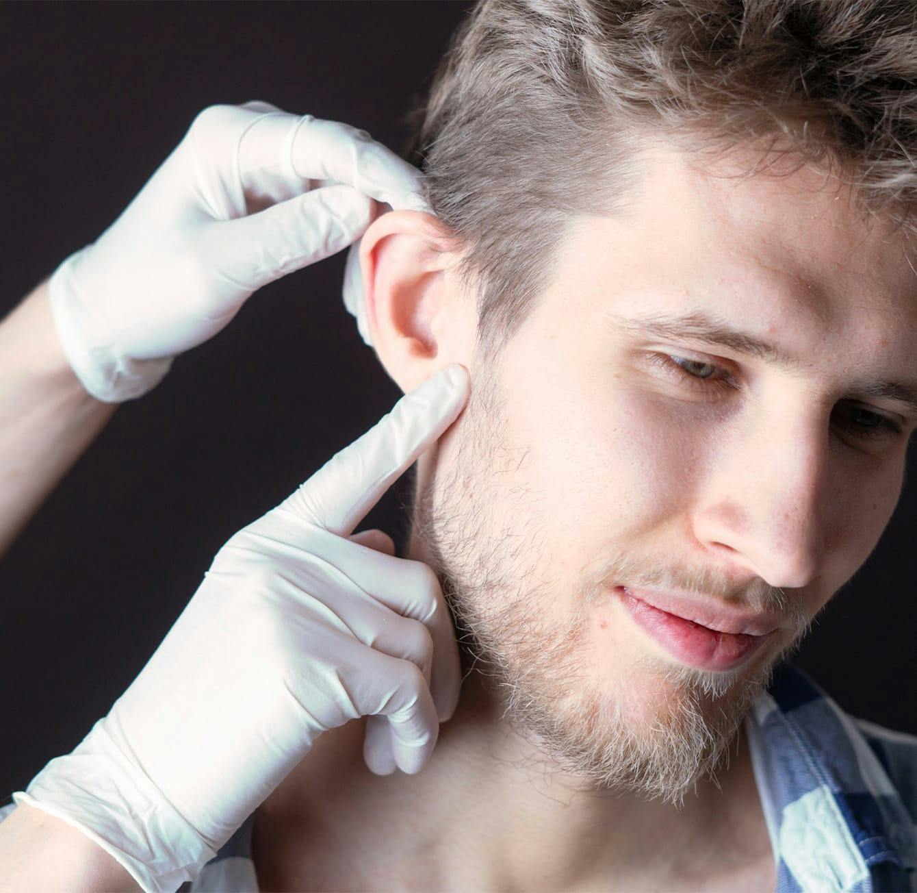 men getting hearing aids