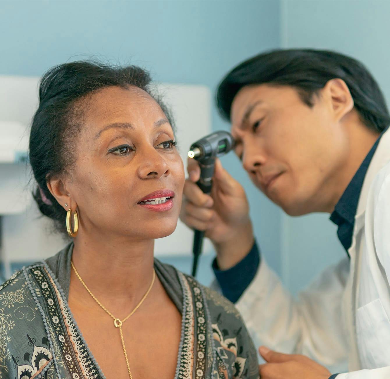 woman getting an ear exam