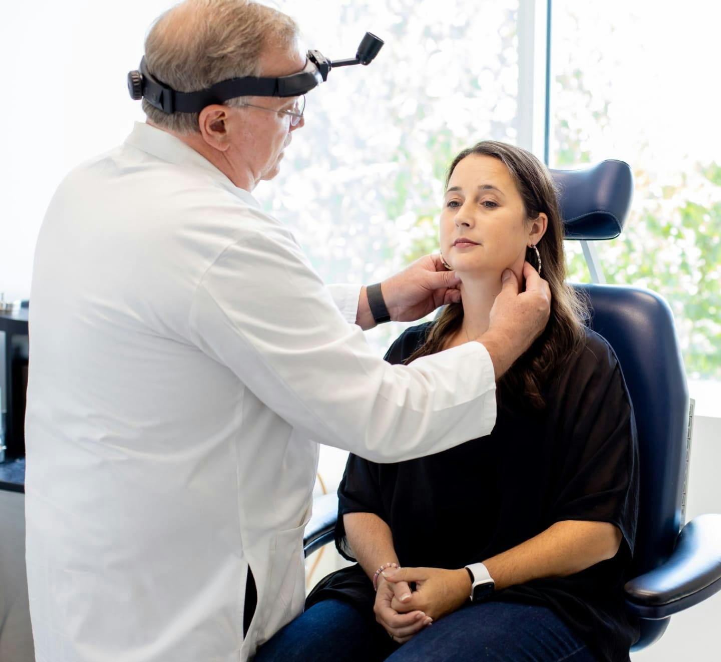 Doctor examing a patient.