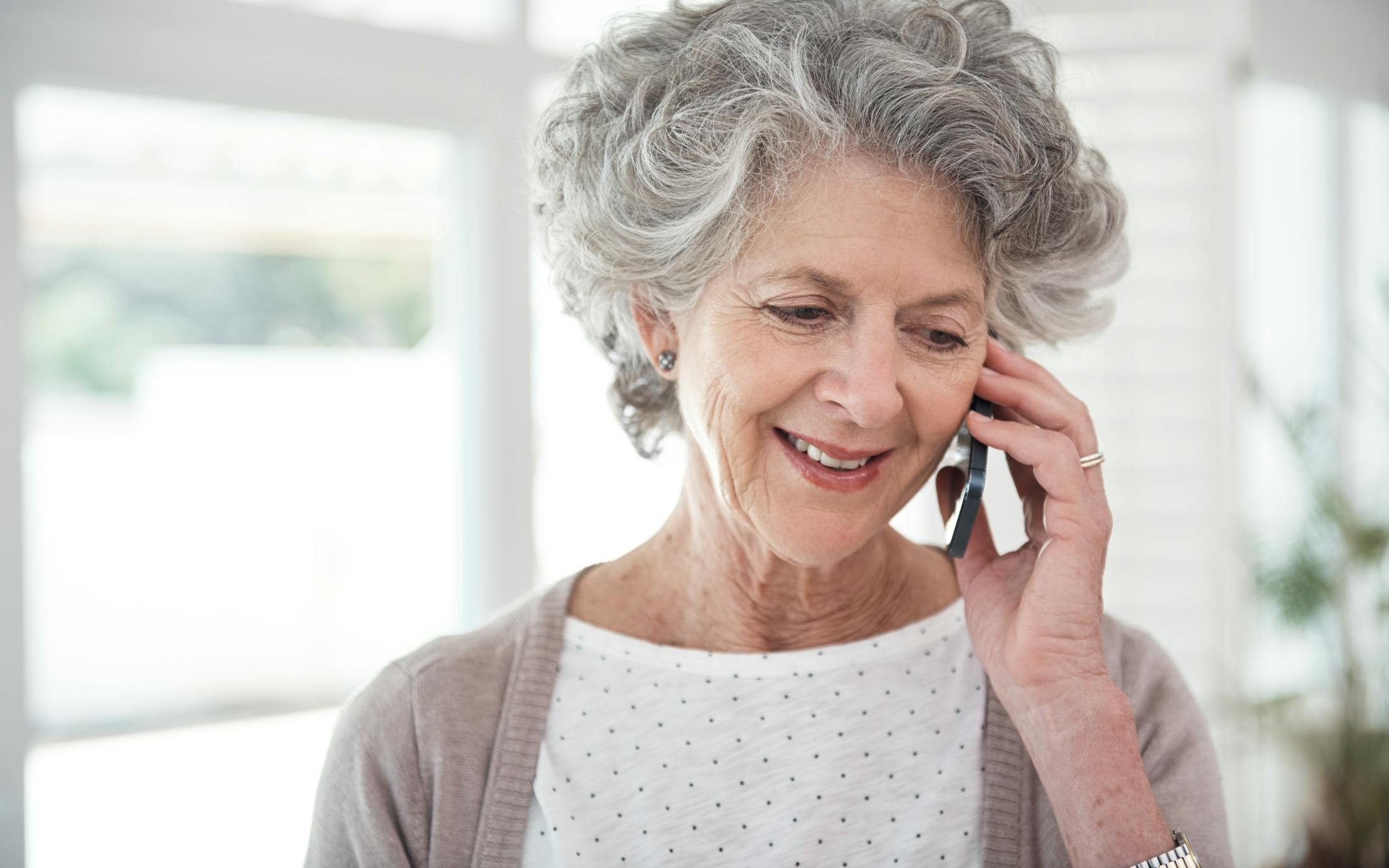 senior woman on mobile phone