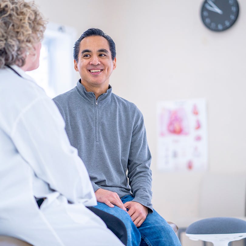 doctor speaking with patient