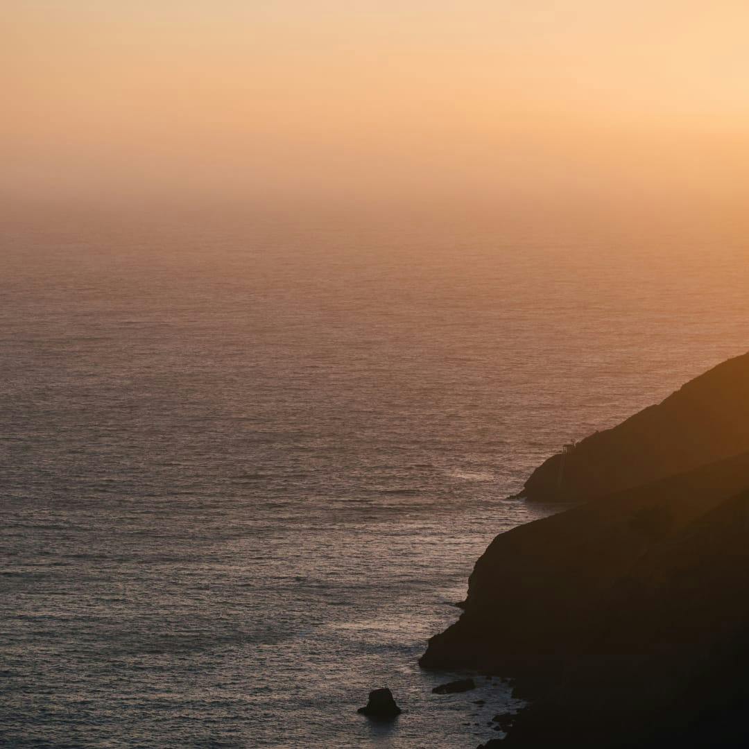 beach cliff at dusk