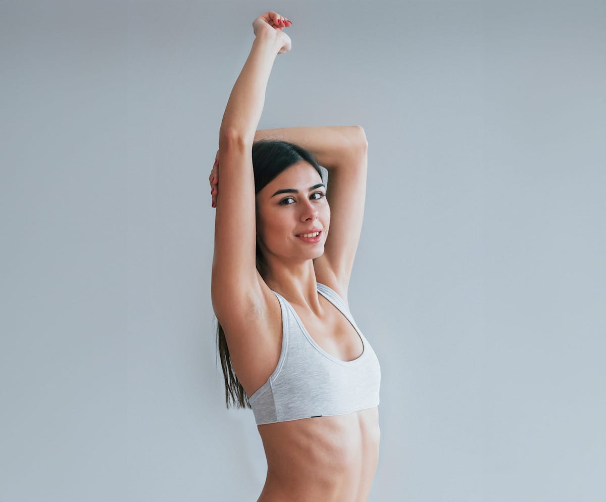 Woman posing in grey underwear