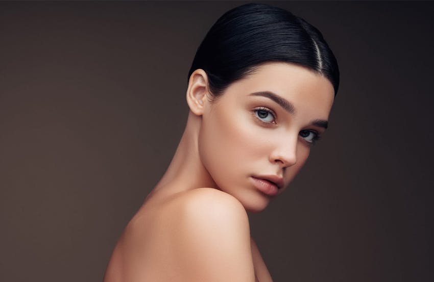 Woman glancing over shoulder