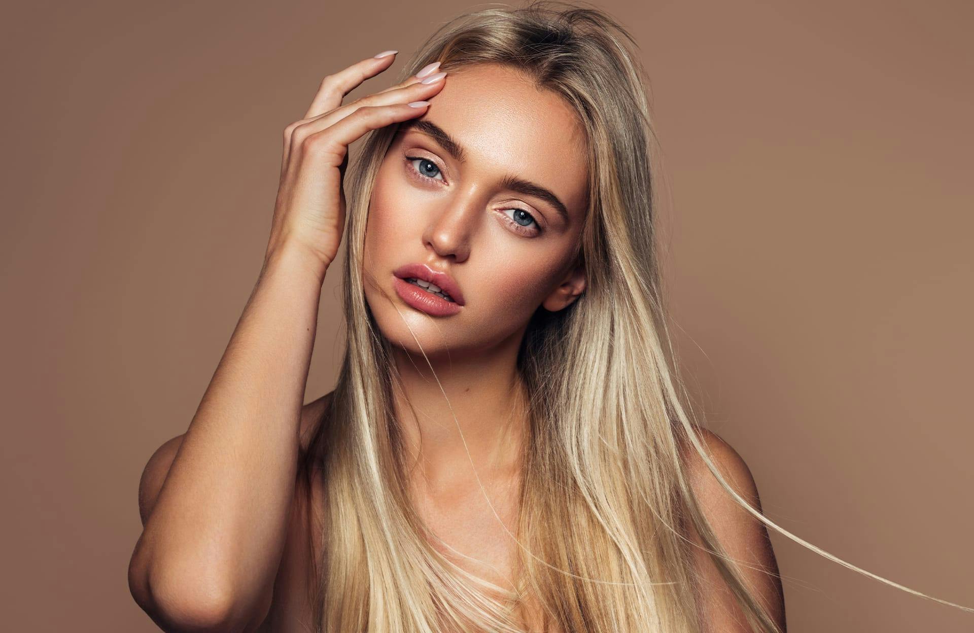 Woman moving her hair out of the way