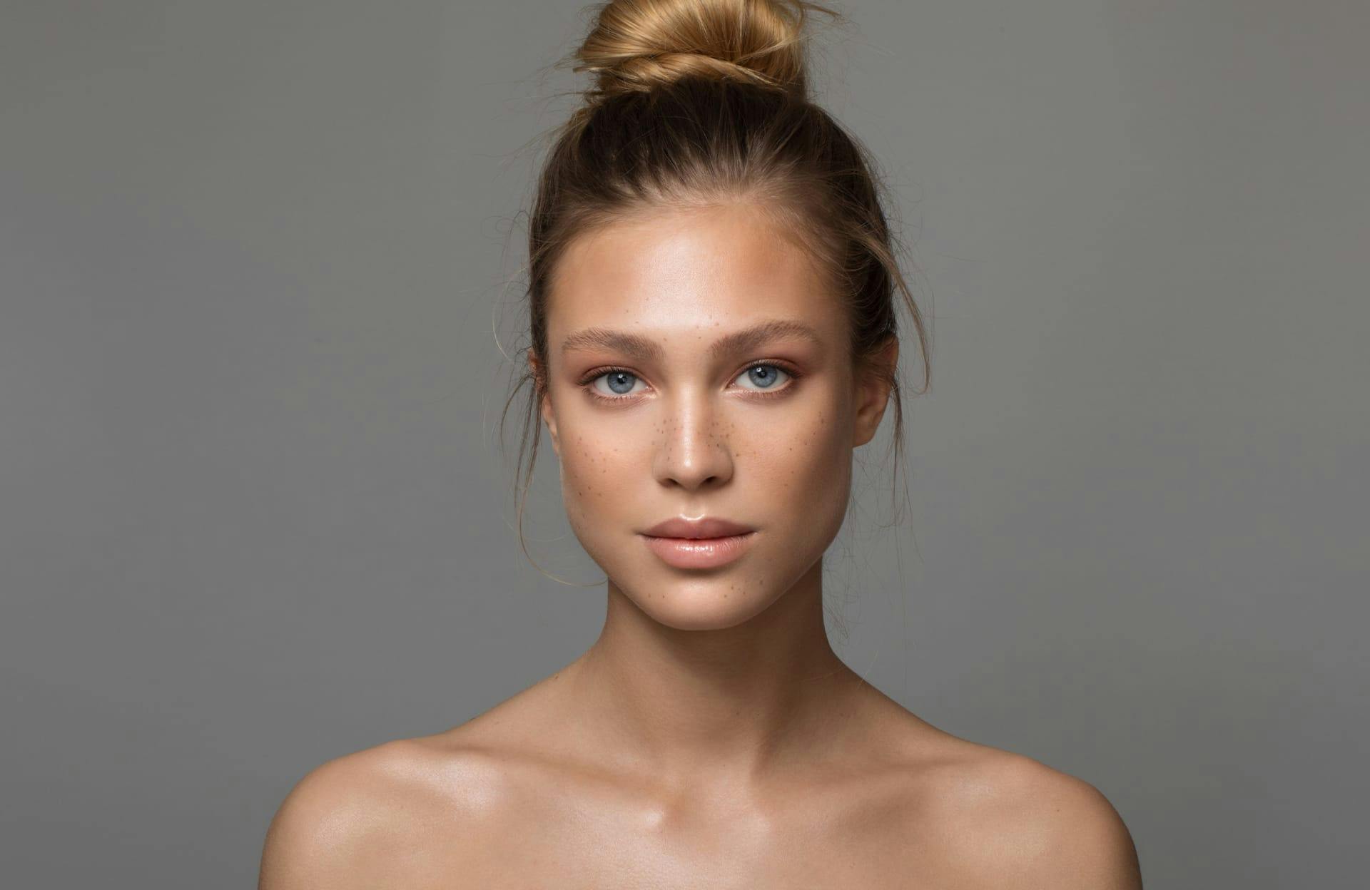 Woman with hair tied back