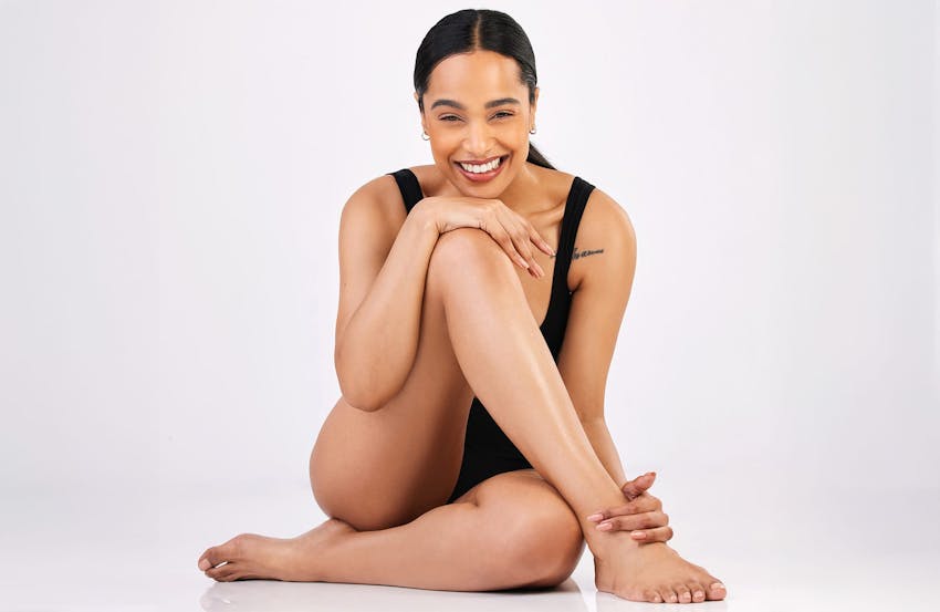 Woman in black leotard