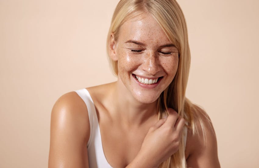 blonde woman laughing