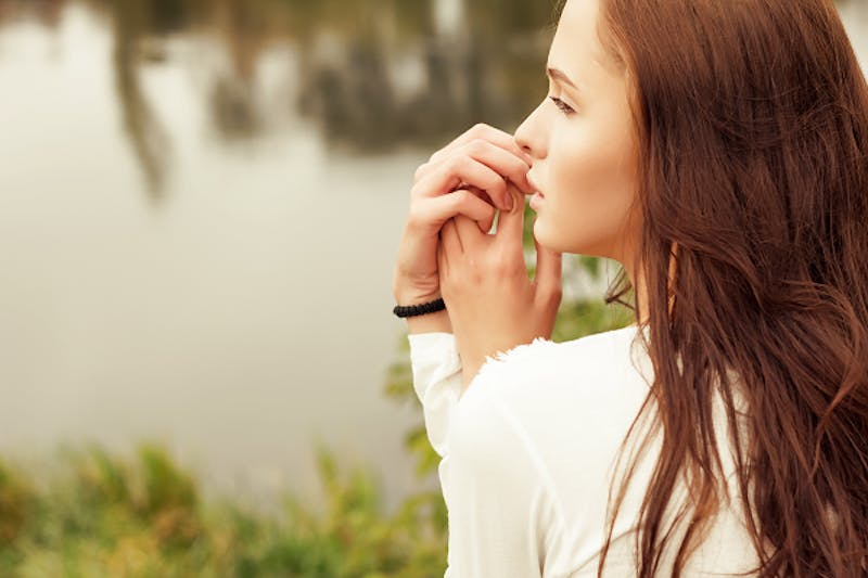 Woman sitting outside