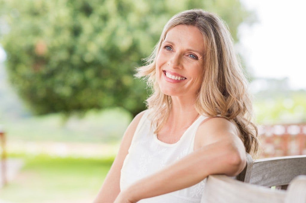 Woman sitting outside