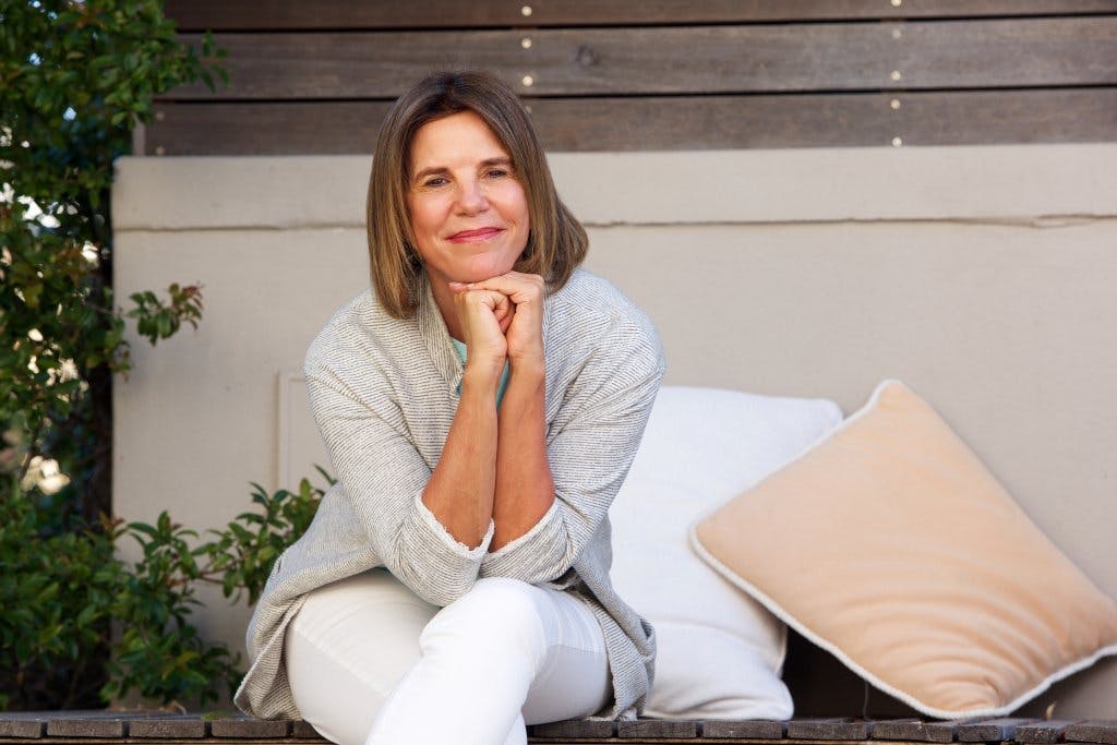 Woman sitting down outside