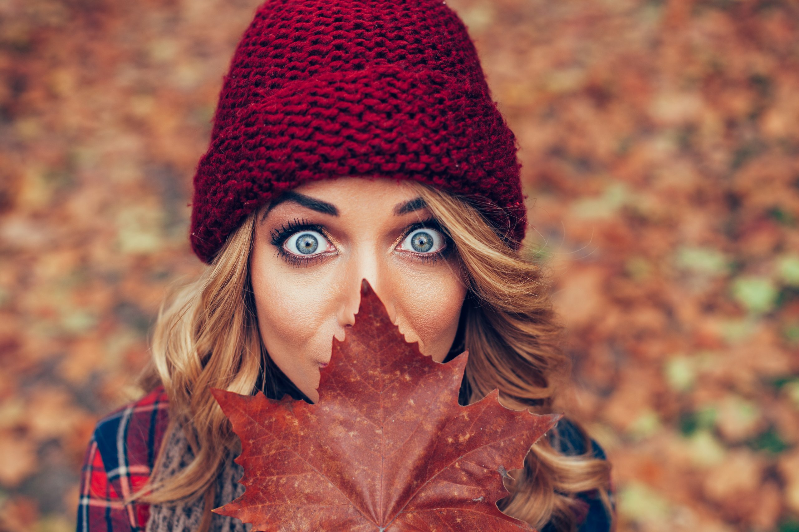 Woman holding a leaf