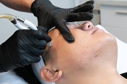 Person recieving facial treatment