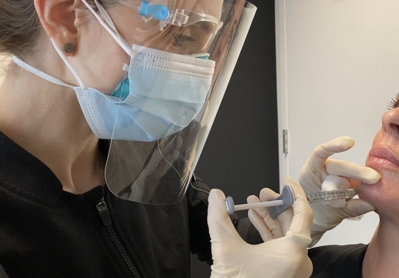 Patient recieving injections in their chin