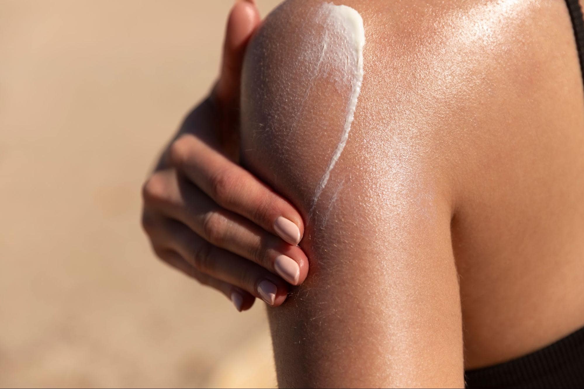 Person applying sun protection