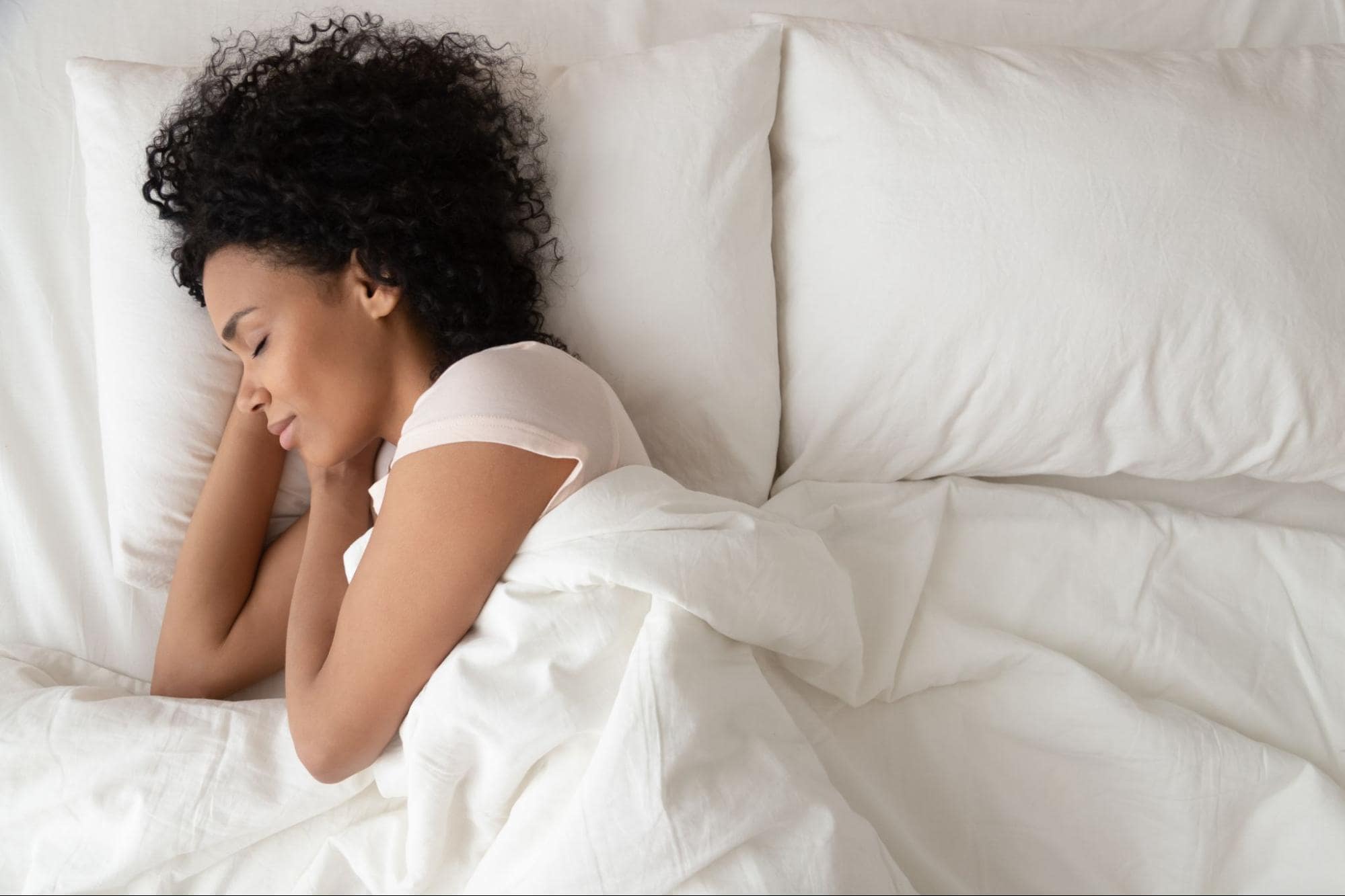 Woman lying in bed